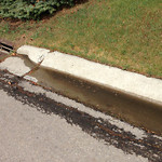Drainage Issue on Road at 316–328 Varsity Estates Mews NW