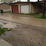 Drainage Issue on Road at 2000–2098 51 Ave SW