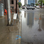 Drainage Issue on Road at 301–317 10 Ave SE
