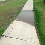 Drainage Issue on Road at 3636–3698 Westwinds Dr NE