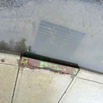 Drainage Issue on Road at 2408 2440 24 A St SW Calgary, Ab T3 E 1 V9