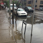 Drainage Issue on Road at 400–598 11 Ave SW