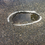 Potholes at 15228–15244 Deer Run Dr SE