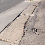 Potholes at 1952–2018 52 St SE