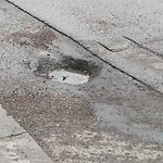 Potholes at 725 17 Ave SW Calgary, Ab T2 S 0 B6