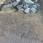 Drainage Issue on Road at 2200–2498 Sumac Rd NW