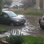 Drainage Issue on Road at 1902 33 St SW Calgary, Ab T3 E 2 S5