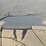 Drainage Issue on Road at 1000–1094 20 Ave NW