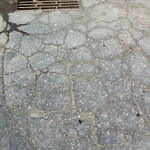 Potholes at 7550–7598 44 St SE