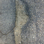 Potholes at 7501–7599 44 St SE