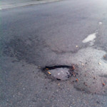 Potholes at 128–298 Sundown Way SE