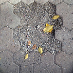 Cracks or Uneven Surfaces on Road at 100–198 10 A St NW