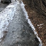 Snow on Pathway or City-maintained Sidewalk at 1816 33 Av SW