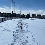 Snow on Pathway or City-maintained Sidewalk at 307 Martin Crossing Pl NE
