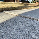 Sidewalk or Curb - Repair at 14539 Parkland Bv SE