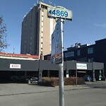 Sign on Street, Lane, Sidewalk - Repair or Replace at 520 24 Av SW