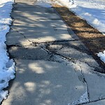 Sidewalk or Curb - Repair at 8665 John Laurie Bv NW