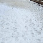 Snow On City-maintained Pathway or Sidewalk at 608 Ranch Estates Ba NW