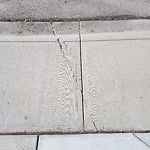 Sidewalk or Curb - Repair at 8 Signature Pl SW