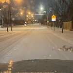 Snow On City Road at 256 Fish Creek Bv SW
