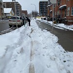 Snow On City-maintained Pathway or Sidewalk at 1405 2 St SW