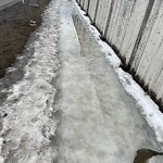 Snow On City-maintained Pathway or Sidewalk at 59 Saddlemont Cr NE