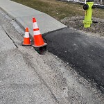 Sidewalk or Curb - Repair at 711 5 St NE