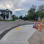 Sign on Street, Lane, Sidewalk - Repair or Replace at 302 18 St NW