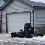 Debris on Backlane at 171 Saddlemont Crescent NE Northeast Calgary