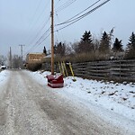 Debris on Backlane at 117 Fairview Dr SE