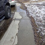 Sidewalk or Curb - Repair at 261 Somerside Close Sw, Calgary, Ab T2 Y 4 B6, Canada