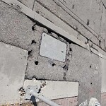 Sidewalk or Curb - Repair at 1039 17 Av SW