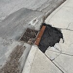 Sidewalk or Curb - Repair at 201 28 Av NE