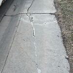 Sidewalk or Curb - Repair at 169 Saddlebrook Wy NE