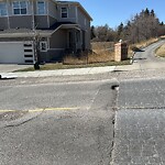 Pothole Repair at 303 Hamptons Dr NW