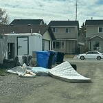 Debris on Backlane at 214 Martinbrook Pl NE