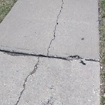 Sidewalk or Curb - Repair at Ca Woodbine Calgary