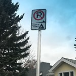 Sign on Street, Lane, Sidewalk - Repair or Replace at 502 17 Av NW