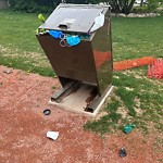 Garbage in a Park at 1029 4 Av SW