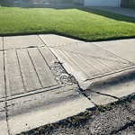 Sidewalk or Curb - Repair at 387 Chaparral Dr SE