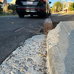 Sidewalk or Curb - Repair at 202 24 Av SW