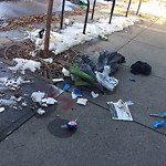 Debris on Street, Sidewalk, Boulevard at 909 8 Av SW