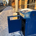 Debris or Overflowing Garbage Bins - in a Park at 438 9 Av SE