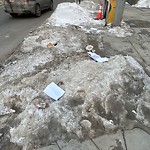 Debris on Street, Sidewalk, Boulevard at 741 7 Av SW