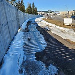Snow On City-maintained Pathway or Sidewalk at 211 Taracove Pl NE