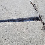 Sidewalk or Curb - Repair at 125 Sundown Way SE Sundance