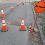 Sign on Street, Lane, Sidewalk - Repair or Replace at 203 25 Av NE