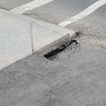 Sidewalk or Curb - Repair at 400 2 St SW