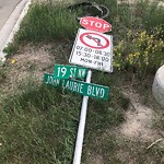 Sign on Street, Lane, Sidewalk - Repair or Replace at 1998 John Laurie Bv NW