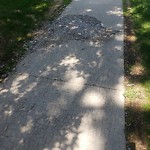 Sidewalk or Curb - Repair at 716 3 Av NW